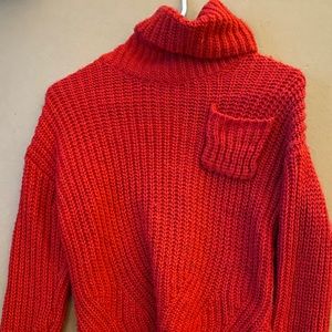Red turtleneck sweater